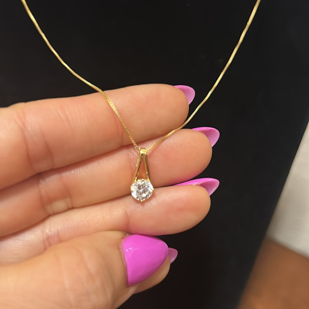Elegant Gold Necklace with Crystal Pendant
